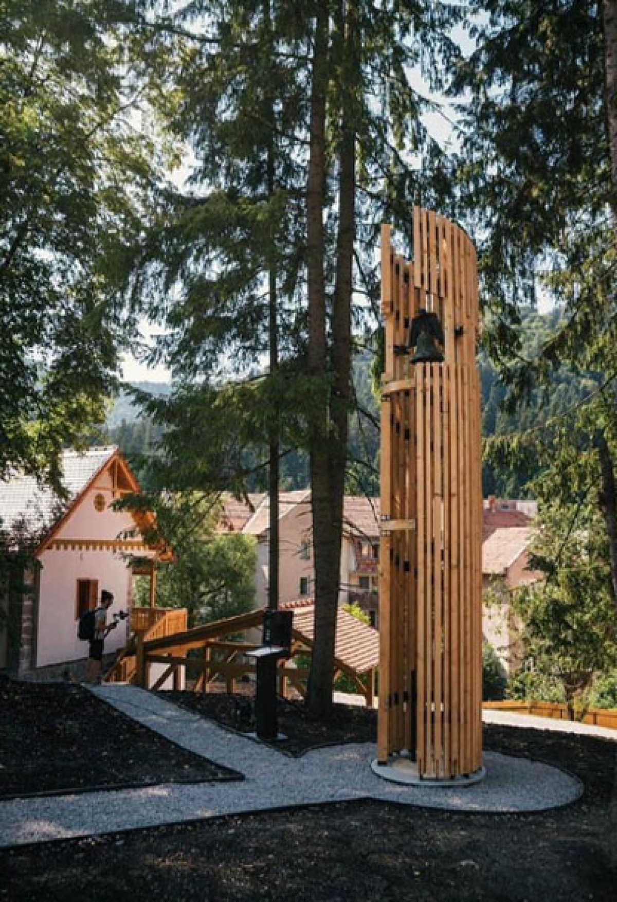 Bell Tower / the bell found protection within the "arms" of five pine trees